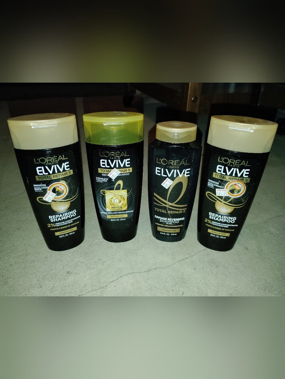 L'Oreal Elvive Repairing Shampoo - Black & Gold Set Of Four. Shampoo Bundle